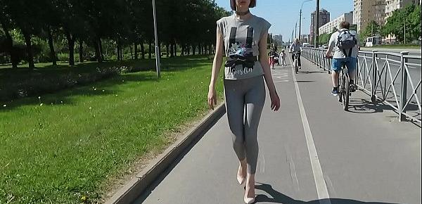  Sexy Natalia walks down the street in tight leggings